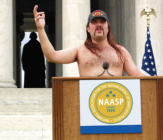 NAASP president Bud Hutchins speaks at the Jefferson Memorial.